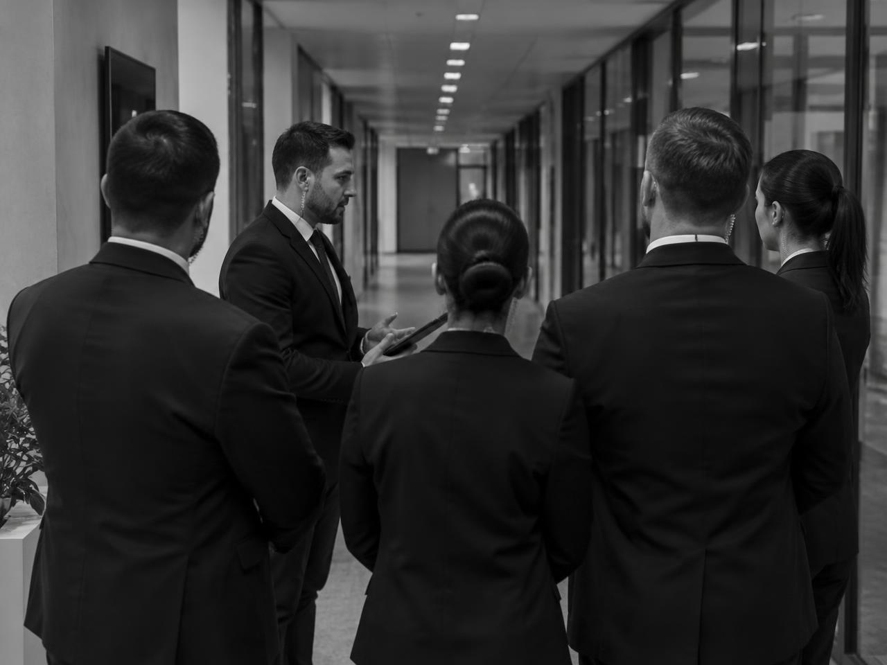 Security team briefing in a corporate office